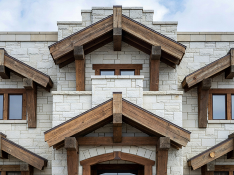 Limestone facade and rustic wooden architectural framing representing Grand Lodge design elements at Casino Rama